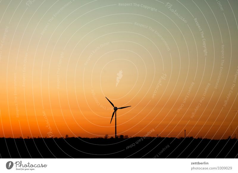Wind turbine in the evening Village Twilight Far-off places Horizon Landscape Mecklenburg-Western Pomerania Deserted Baltic Sea Baltic island Rügen Sun Sunset