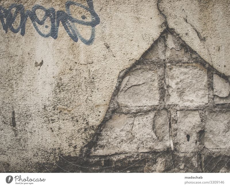 pyramid Manmade structures Wall (barrier) Wall (building) Facade Sign Characters Graffiti Broken Trashy Dry Town Decline Past Transience Colour photo