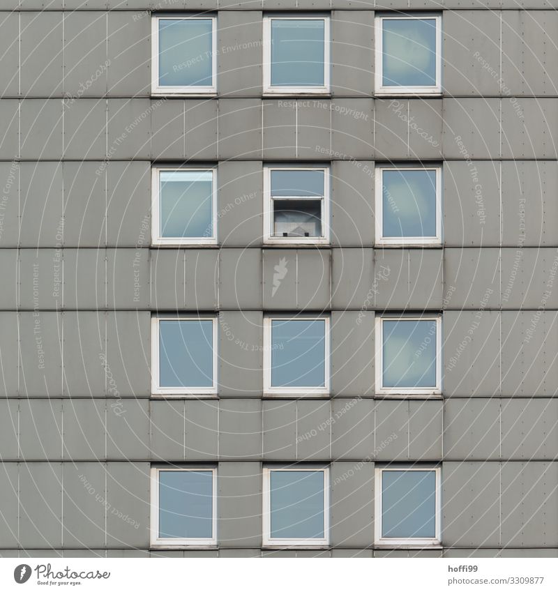 bleak high-rise facade with a half-open window House (Residential Structure) High-rise Building Facade Window Stone Glass Line Poverty Threat Cold Broken Modern