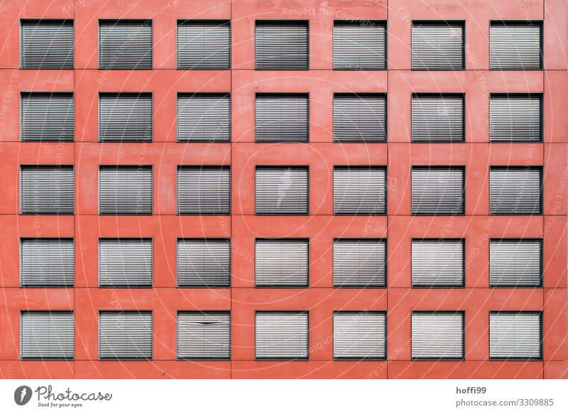 Red facade with many windows / blinds, a water tap and a bend Building Wall (barrier) Wall (building) Facade Window Venetian blinds Line Esthetic Exceptional