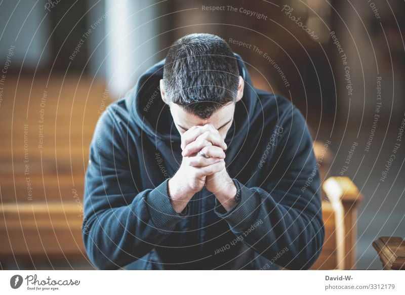 Man crouches praying in the pew Church Faith & Religion Hope weaker believe mourn praying hands Prayer Church pew Church congress Folded folded hands Belief