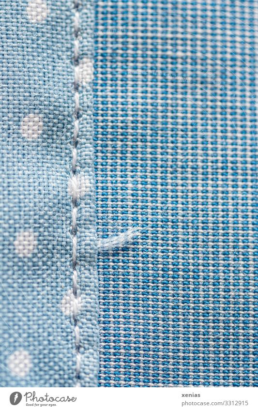 blue fabric with seam and dots Clothing Stitching Sewing thread Line Net Soft Blue White Point Spotted Rectangle End of thread Studio shot Close-up Detail