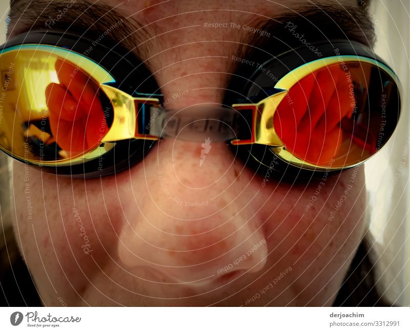Reflection of swimming goggles. The glasses sit on the eyes of a girl. Life Aquatics Swimming & Bathing Feminine Family & Relations Youth (Young adults) Face 1