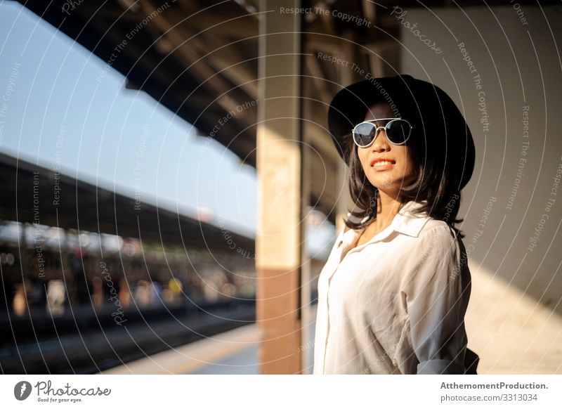 Black hat woman at train platform. Lifestyle Joy Happy Beautiful Relaxation Calm Leisure and hobbies Vacation & Travel Tourism Trip Adventure Freedom Summer