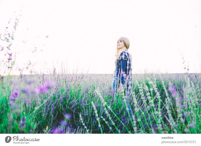 Young blonde woman alone in a lavender field Beautiful Life Freedom Summer Garden Gardening Woman Adults Environment Nature Spring Flower Agricultural crop