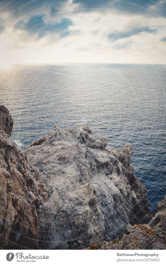 Rocky outcrop (Mediterranean) Vacation & Travel Tourism Summer Summer vacation Ocean Island Environment Nature Elements Water Sky Clouds Beautiful weather