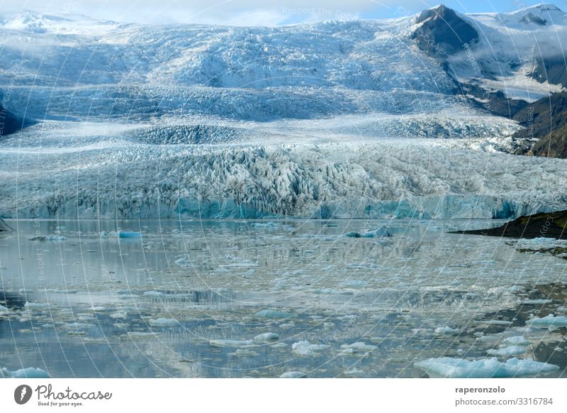 Part of a glacier in Iceland in sunlight Glacier Glacier ice glacial lake sparkle icily chill Blue Climate glacier blue Landscape Climate change Deserted
