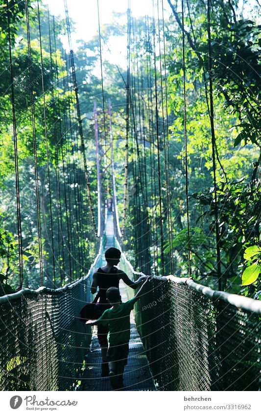 rope | hope it holds! Sunlight Colour photo Exterior shot Together Mother Infancy Trust Child Freedom Parents Far-off places Adventure Trip Tourism