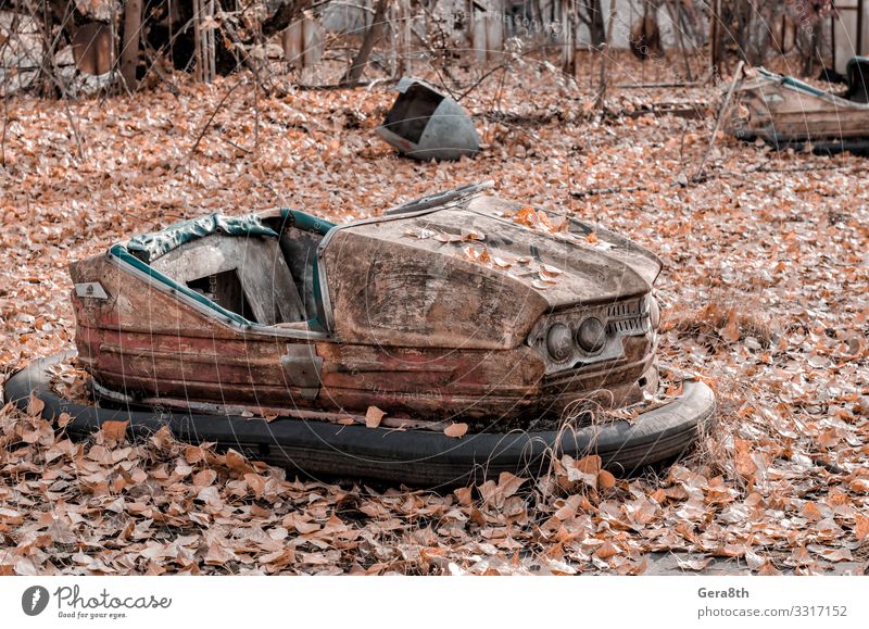 rusty car in an abandoned amusement park in Chernobyl Ukraine Vacation & Travel Tourism Trip Nature Plant Autumn Tree Leaf Park Transport Car Rust Old Threat