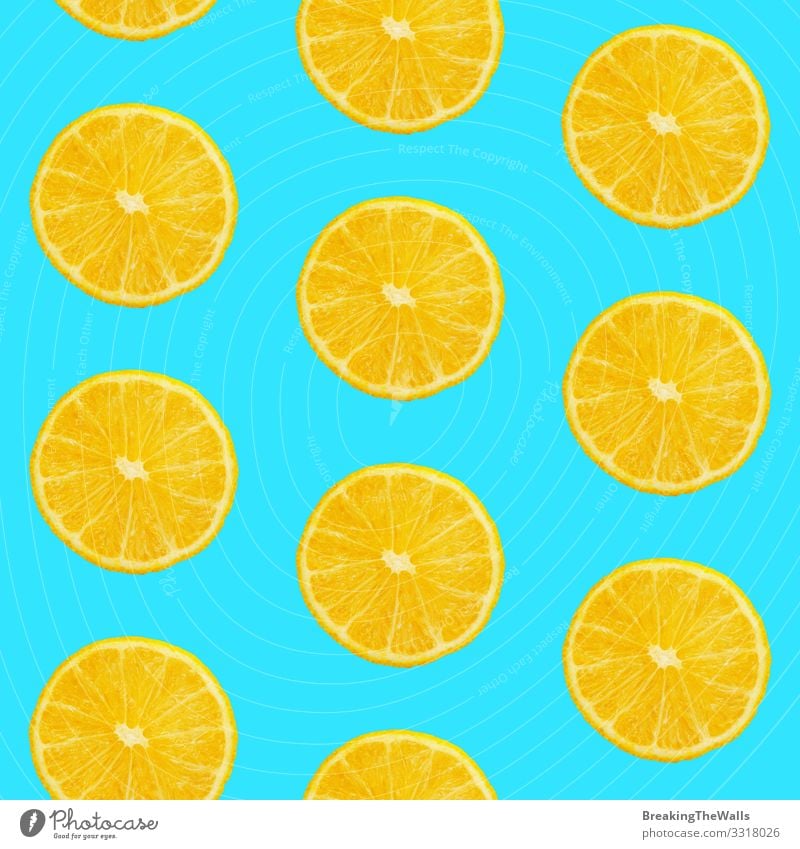 Seamless pattern of oranges on blue background Food Fruit Orange Eating Vegetarian diet Design Healthy Eating Fresh Juicy Blue Yellow Colour Tangerine