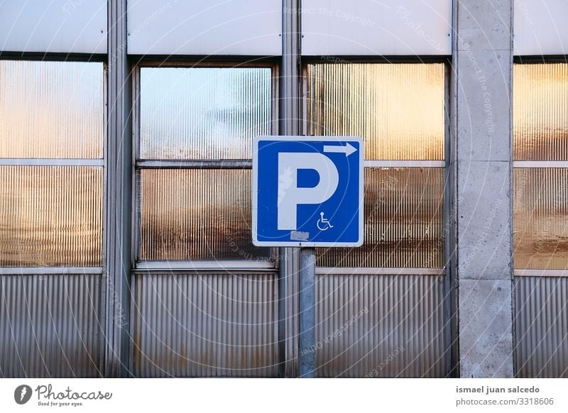 wheelchair traffic signal on the street in Bilbao city Spain symbol disabled disabled sign parking accessibility care road road sing asphalt handicapped icon