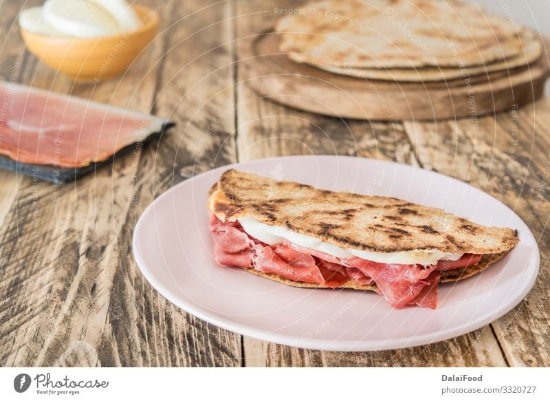 Piadina typical italian food Sausage Cheese Vegetable Bread Nutrition Lunch Vegetarian diet Plate Wood Fresh Above Black Tradition appetizer Rucola Bakery