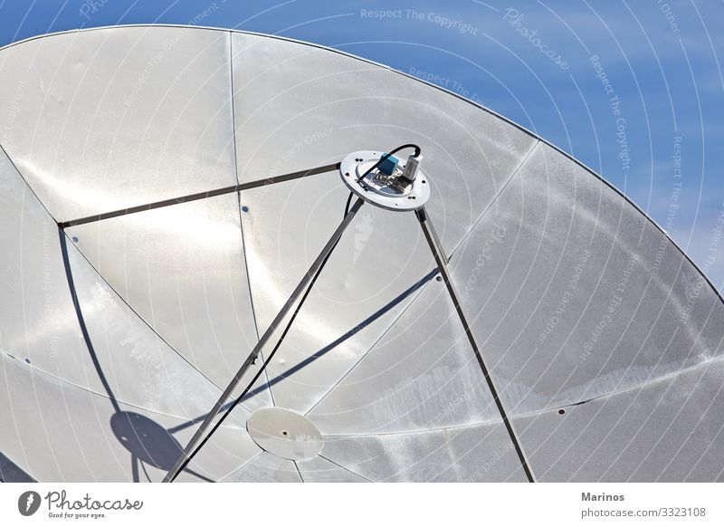 Closeup view of satellite dish.Communications. Telecommunications Telephone Technology Internet Media Television Earth Sky Antenna Telescope Communicate