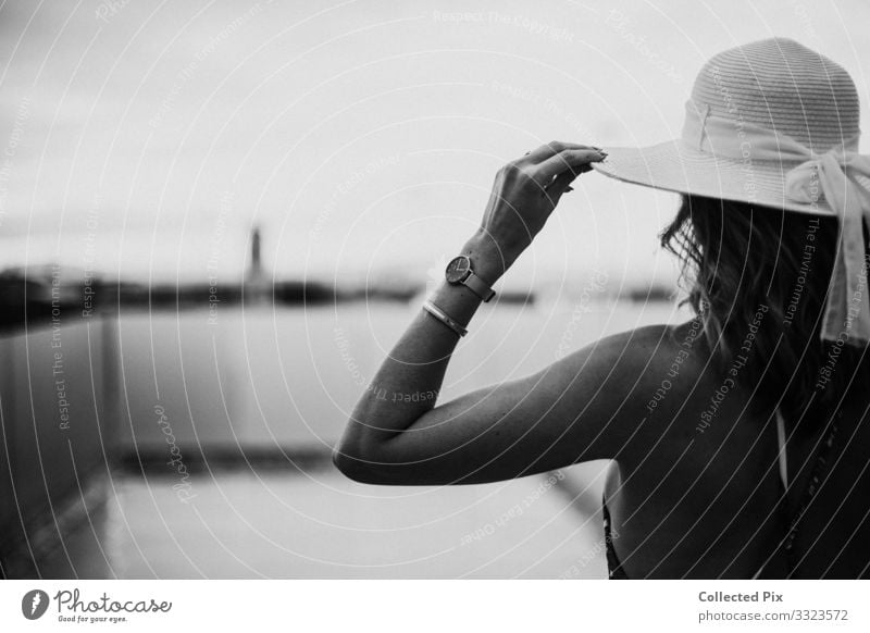 Woman holding her hat wearing a bikini Lifestyle Elegant Style Design Vacation & Travel Adventure Freedom Sightseeing Summer Summer vacation Sunbathing Adults