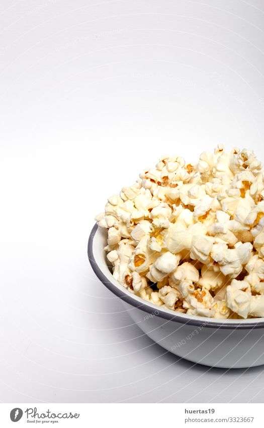 Popcorn on colored backgrounds Food Fast food Bowl Entertainment Cinema Fresh Delicious White Colour Snack Salty movie Classic full pop Tasty isolated fluffy