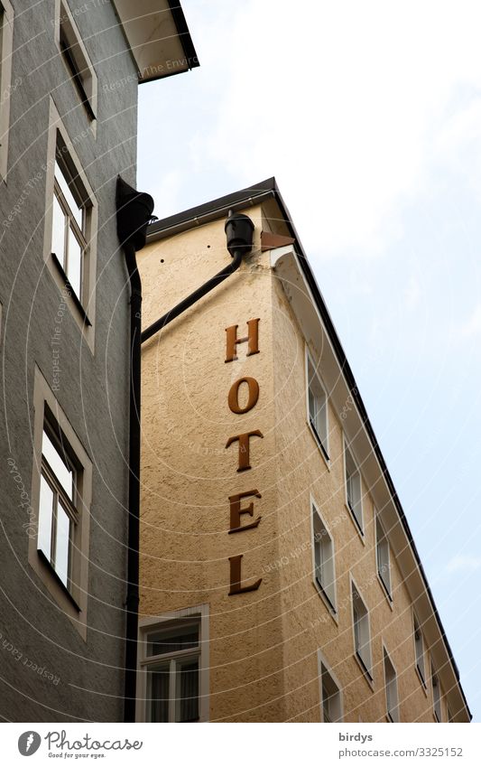 HOTEL Vacation & Travel City trip Town Deserted House (Residential Structure) Hotel Facade Window Characters Inscription Authentic Brown Gray Hospitality
