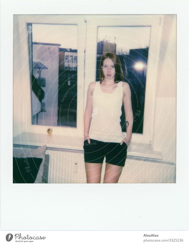 Polaroid of a young woman in front of the window Joy pretty Living or residing Flat (apartment) Young woman Youth (Young adults) 18 - 30 years Adults Window