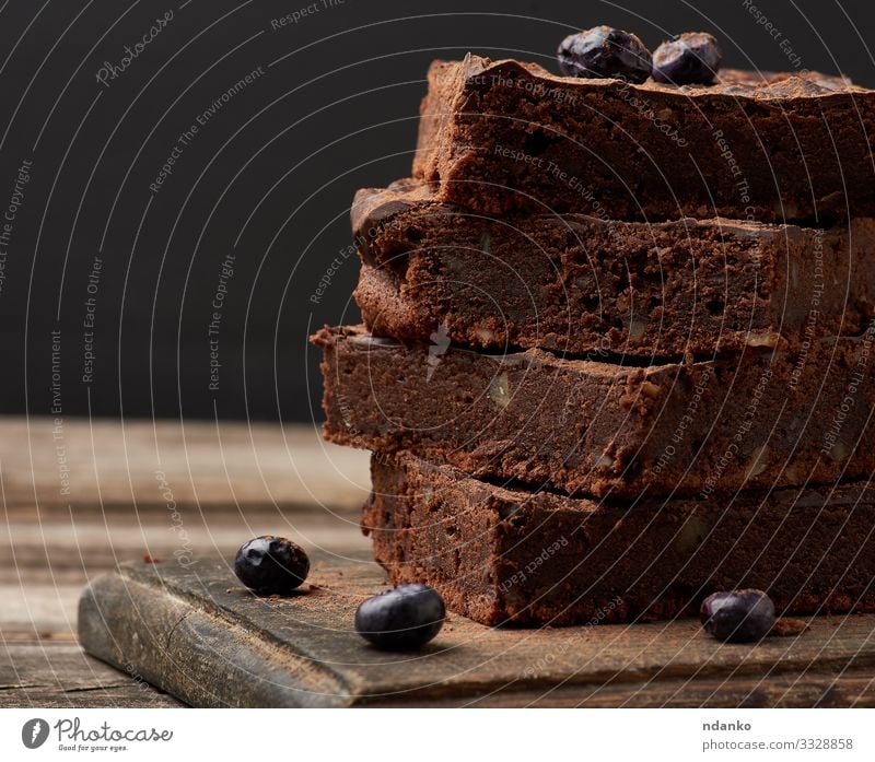 brownie chocolate cake with walnuts Cake Dessert Candy Nutrition Eating Hot Chocolate Table Wood Dark Fresh Delicious Brown Black Tradition cacao Pie piece