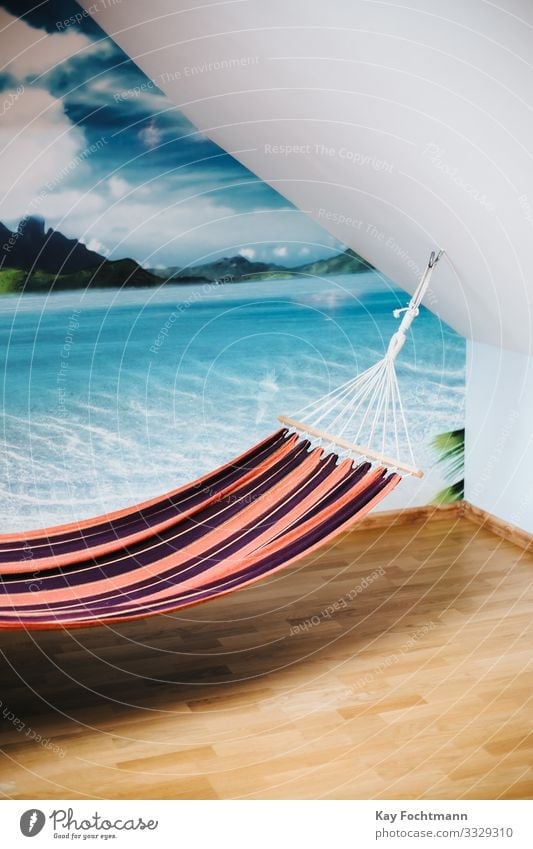 Hammock inside a room with a panorama picture of tropical island on the wall beach calm coast comfort comfortable cozy day dream exotic hammock holiday holidays