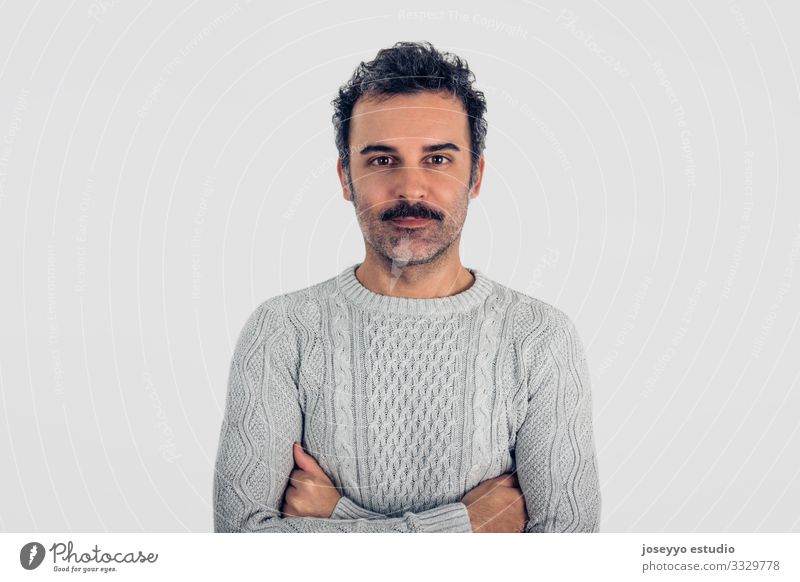 Man with mustache and gray sweater standing with crossed arms. Adults Attractive Brown Cancer Casual clothes Caucasian Self-confident Cool (slang) Copy Space