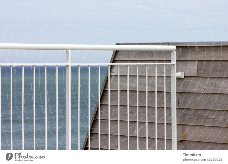 Denmark's North Sea behind bars Ocean Waves Sky Grating Handrail cordon Metal Wood Water Deserted Elements Vacation & Travel Blue White Brown
