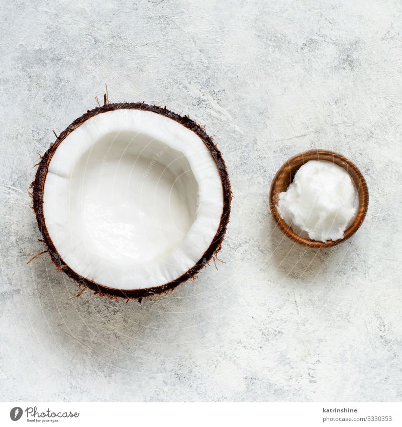 Coconut oil in a bowl and half of coconut Vegetable Nutrition Vegetarian diet Diet Bowl Brown Gray White keto coconut oil Half Ingredients Vegan diet cooking