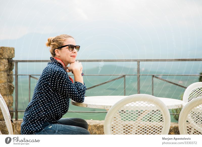 Young woman on a terrace with a beautiful view Lifestyle Joy Vacation & Travel Tourism Table Restaurant Human being Feminine Youth (Young adults) Woman Adults 1