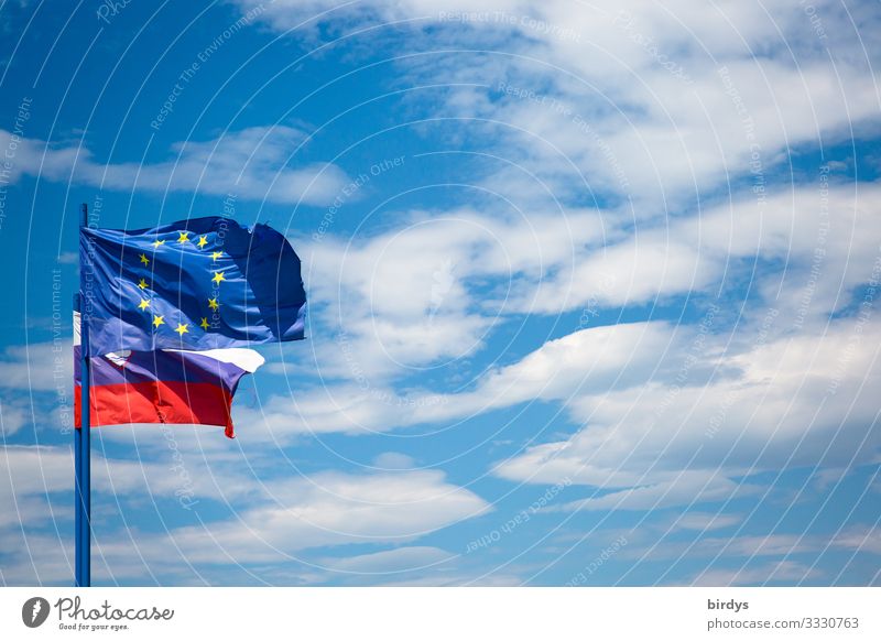 EU flag and Slovenian flag side by side European flag European Union Ensign Sky Clouds Beautiful weather Wind Sign Flag Contentment Self-confident Trust