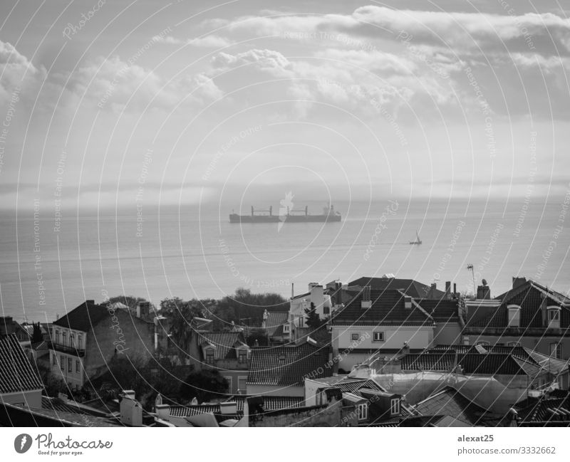 Ship in black and white Transport Navigation Container ship Sell City Black & white photo Landscape Lisbon Portugal no people sea Water Exterior shot