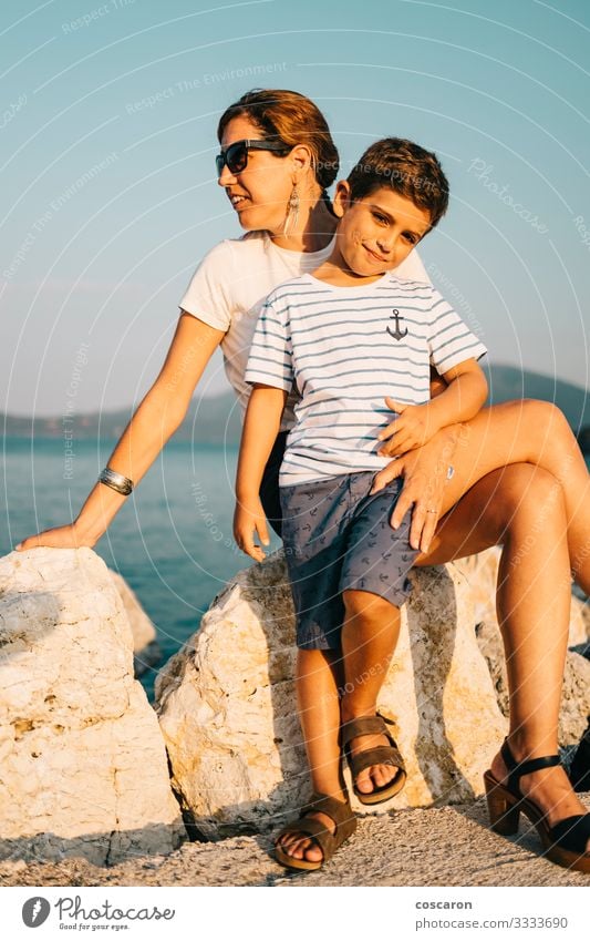 Mother and son enyoying relaxed looking the sea Lifestyle Joy Happy Beautiful Relaxation Vacation & Travel Tourism Trip Adventure Summer Summer vacation Sun