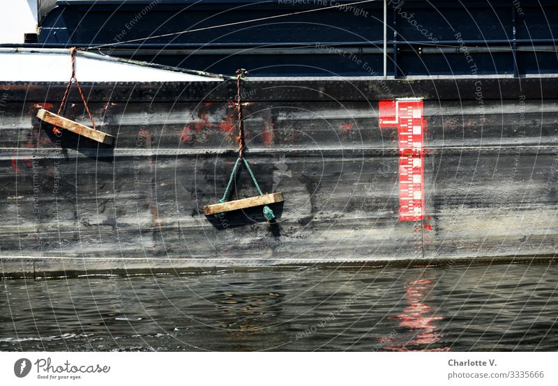 Boat wall | of a barge with draught mark and wooden parts. Reflection in the water. Transport Means of transport Rush hour Navigation Watercraft Harbour Steel