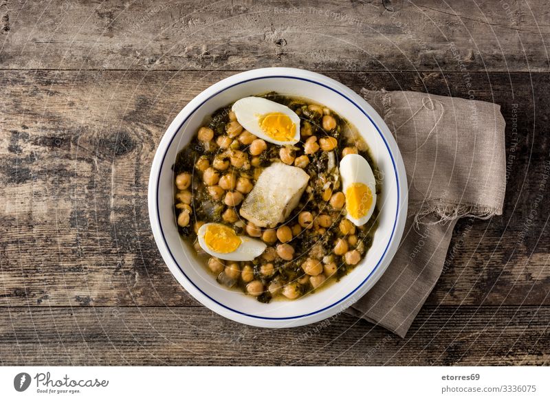 Chickpea stew with spinach and cod or potaje de vigilia. Chickpeas Stew Spinach Cod Food Healthy Eating Food photograph Characteristic Spanish Tradition Easter