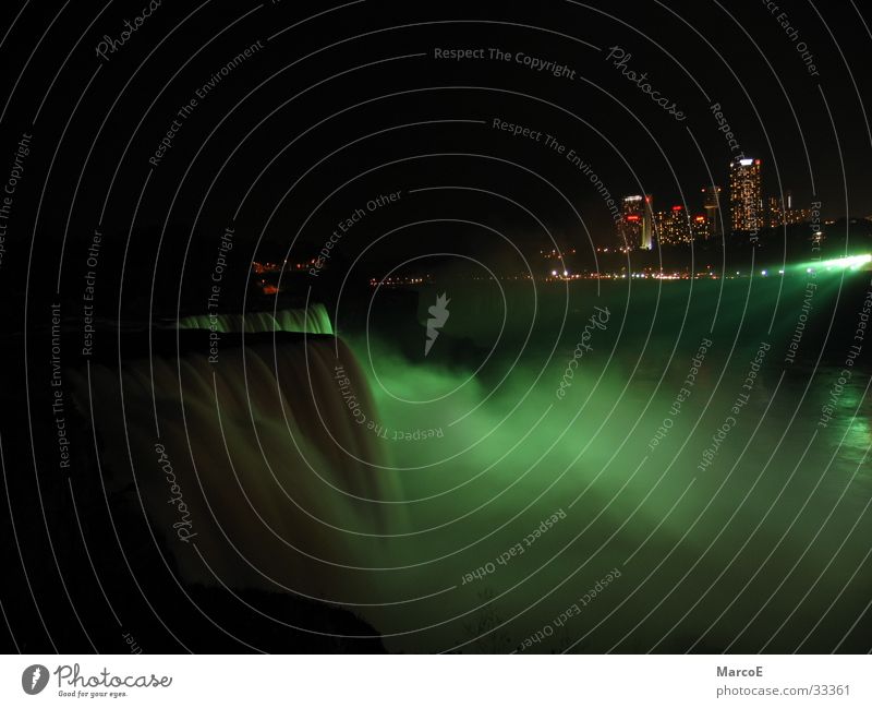 Niragara Falls Niagara Falls (USA) Americas Green Light Water Canada White crest Lighting Night Night shot Famousness Tourist Attraction Destination