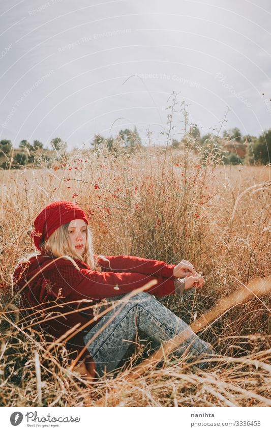 Young woman in a field in a sunny day wearing red clothes Senses Calm Summer Human being Feminine Youth (Young adults) Woman Adults 1 18 - 30 years Nature