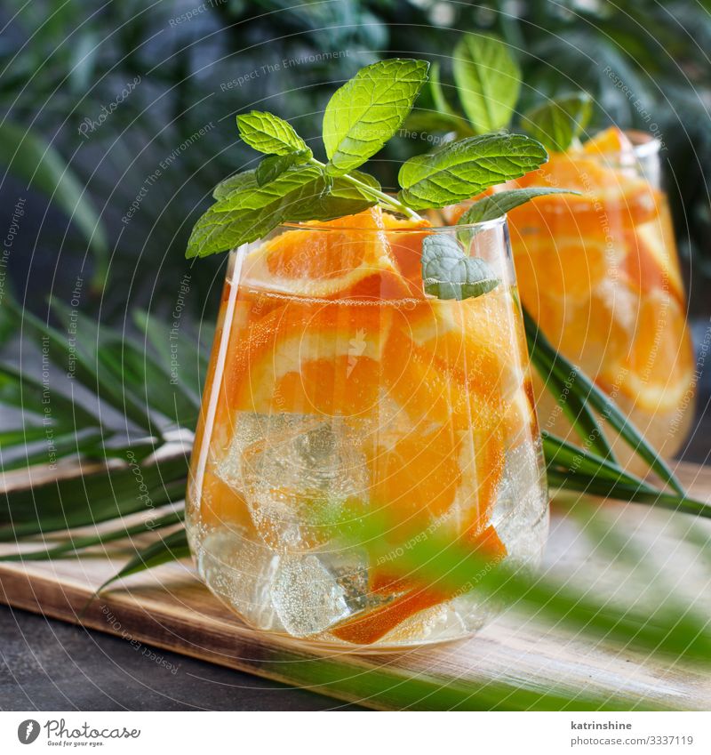 Homemade refreshing mocktail with soda and orange juice Fruit Beverage Lemonade Juice Vacation & Travel Summer Leaf Cool (slang) Fresh Natural Green Red