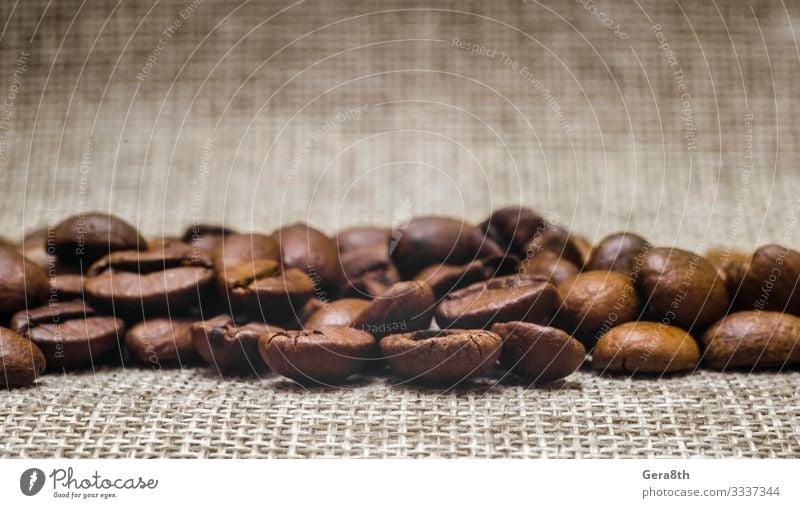 many coffee beans on a matting macro Breakfast Coffee Cloth Dark Fresh Natural Brown Black Energy Colour Aromatic backdrop background Beans Beige blur blurry