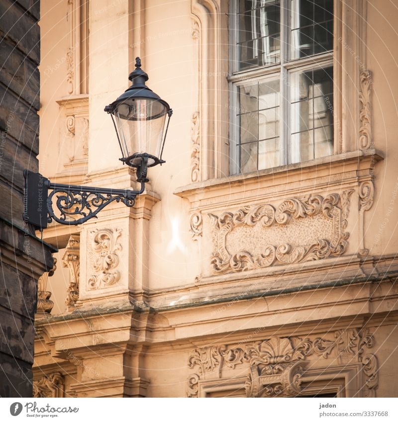 window (closed). light (off). facade (chic). house corner (square). Lantern Light Lamp Street Street lighting Facade Stucco Window Historic Old Square