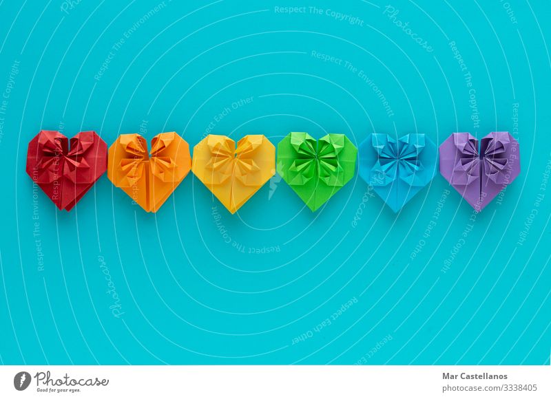 Coloured hearts in a row on a blue background. LGTB+ concept. Lifestyle Freedom Feasts & Celebrations Valentine's Day Wedding Meeting Human being Homosexual