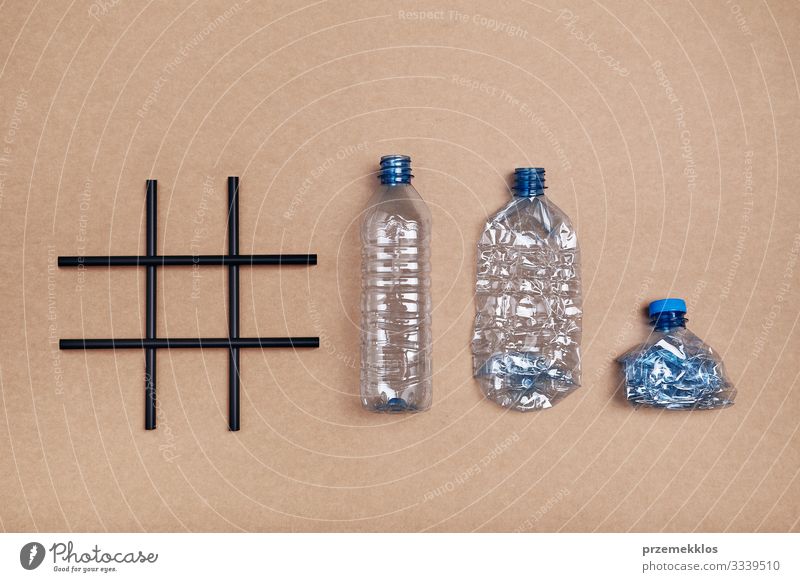 Hashtag recycling. Empty plastic bottles, cup and bottle cap Bottle Save Environment Container Plastic packaging Blue Environmental pollution Trash garbage