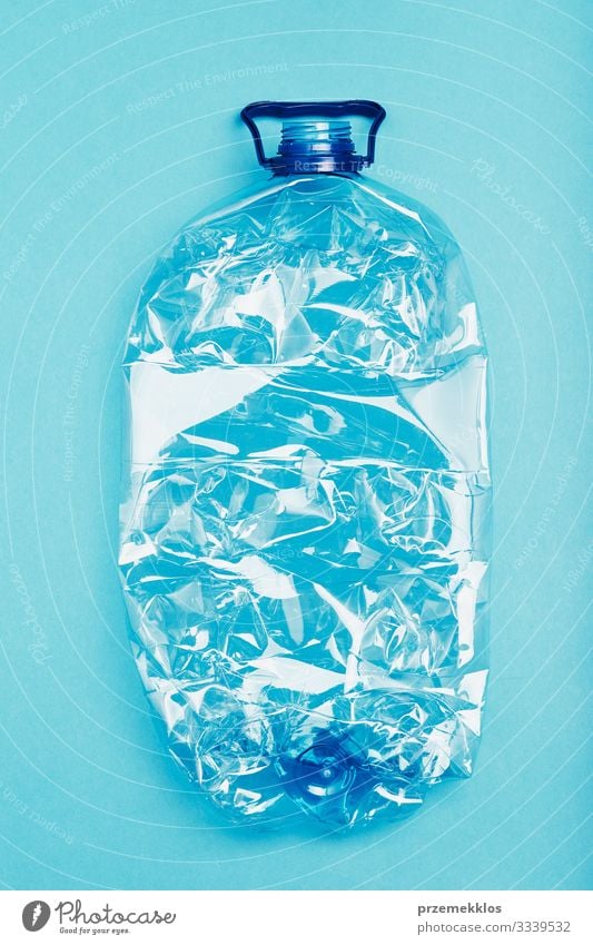 Squashed empty plastic bottle collected to recycling Bottle Save Environment Container Plastic packaging Blue Environmental pollution Trash garbage recycle