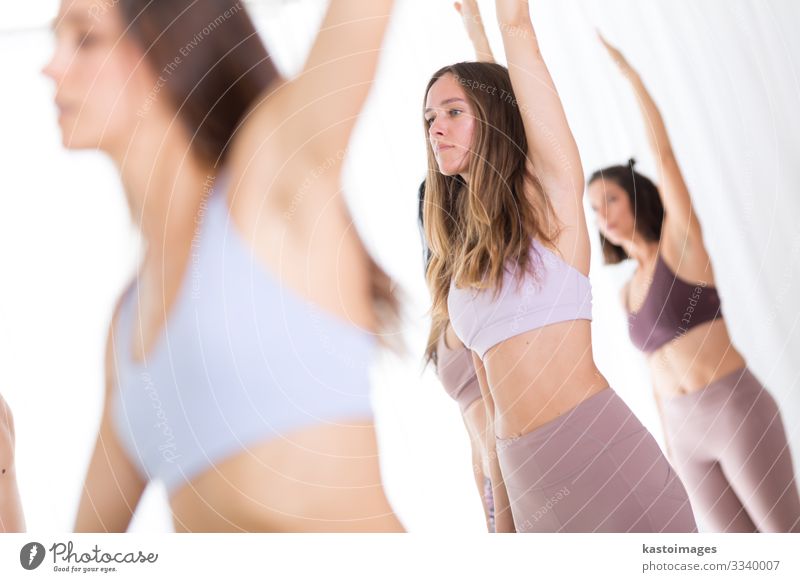 Young Attractive Woman Practicing Yoga Standing Stock Photo