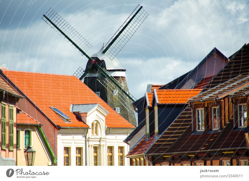 City view with windmill Sightseeing Architecture Clouds Beautiful weather Müritz Downtown House (Residential Structure) Windmill Facade Authentic Historic