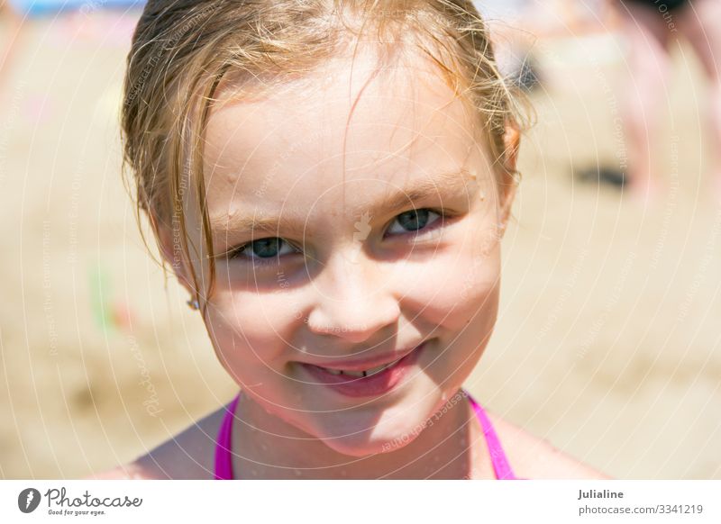 Sweet Girl 7 years old blonde with blue eyes - a Royalty Free Stock Photo  from Photocase