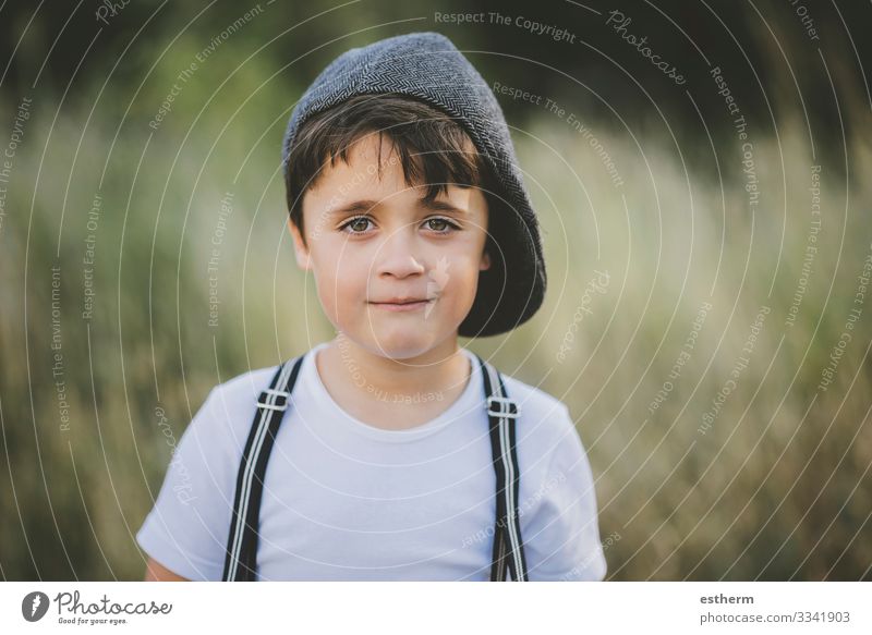 happy child smiling at camera Lifestyle Joy Happy Vacation & Travel Summer Human being Masculine Boy (child) Infancy 1 3 - 8 years Child Nature Landscape Grass