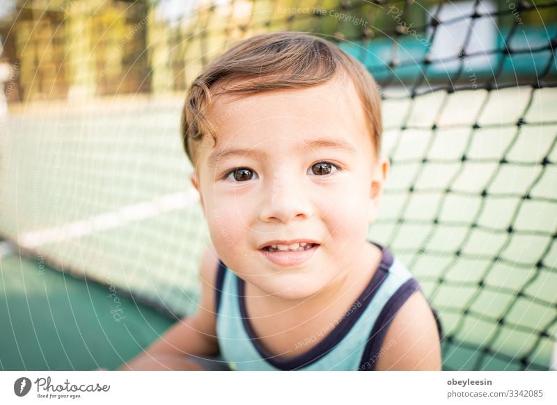 cute young mixed race boy smiling in the sun on the court Joy Happy Beautiful Face Child Human being Toddler Boy (child) Man Adults Infancy Teeth Smiling