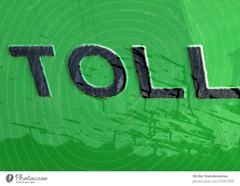 Black lettering TOLL on green metal surface Vacation & Travel Tourism Sightseeing City trip Hamburg Germany Europe Port City Industrial plant Transport
