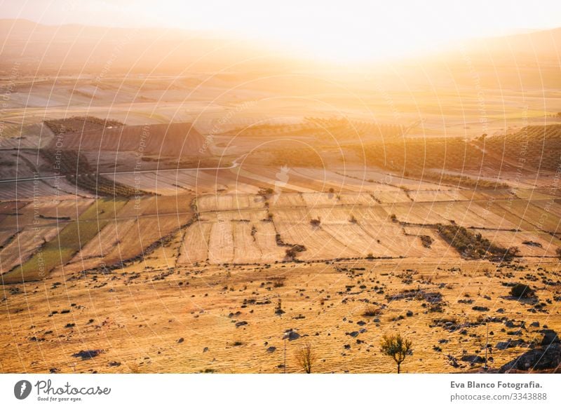 High view of a mosaic landscape on a cloudy day. Spain fields scenery. Beautiful sunset with yellow colors Landscape Environment Sunset Scene Rural