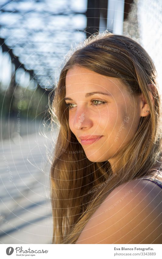 outdoors portrait of a beautiful young woman Portrait photograph Youth (Young adults) Woman Exterior shot Happy Blonde blue eyes Bridge Summer Sunbeam Hair