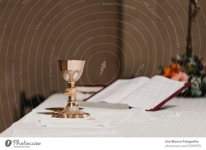 goblet of wine on table during a wedding ceremony nuptial mass. Religion concept jesus Ritual Protestant Modern divine Cup eucharist Goblet Christianity rite