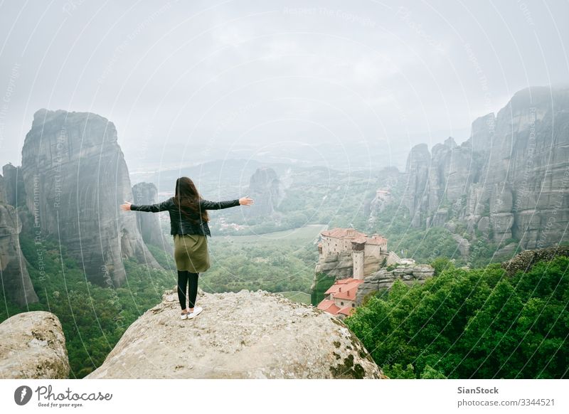 Girl enjoys the view of great and high rock in Meteora, Greece Beautiful Vacation & Travel Tourism Summer Mountain Hiking Woman Adults Culture Nature Landscape